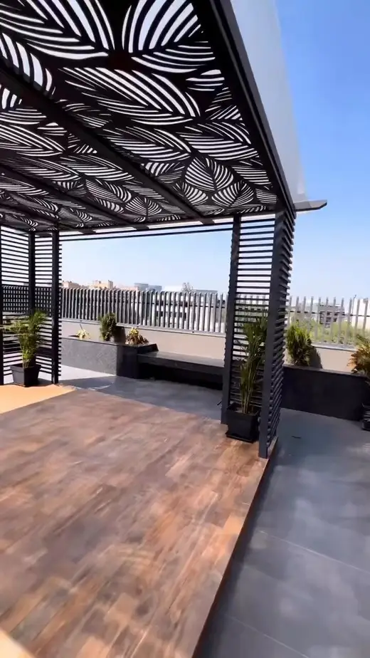 Terrace pergola with leaf jaali roof