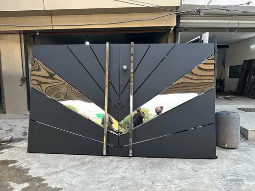 Main gate with steel sunburst