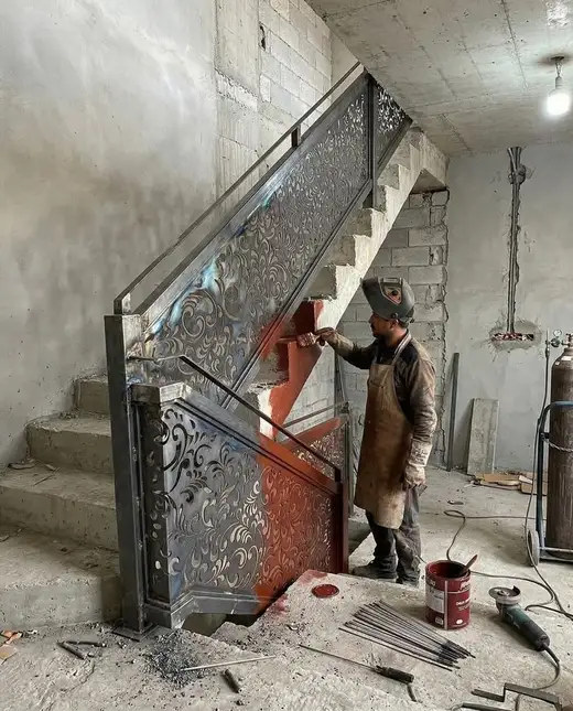 Stair railing, painted on site